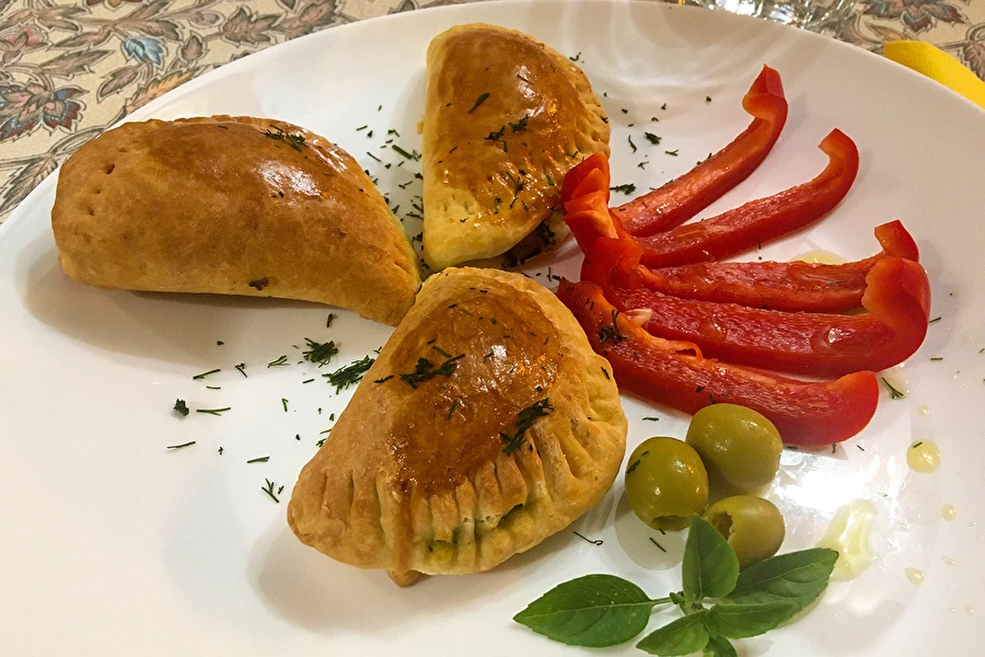Bagte pierogi med spinat
